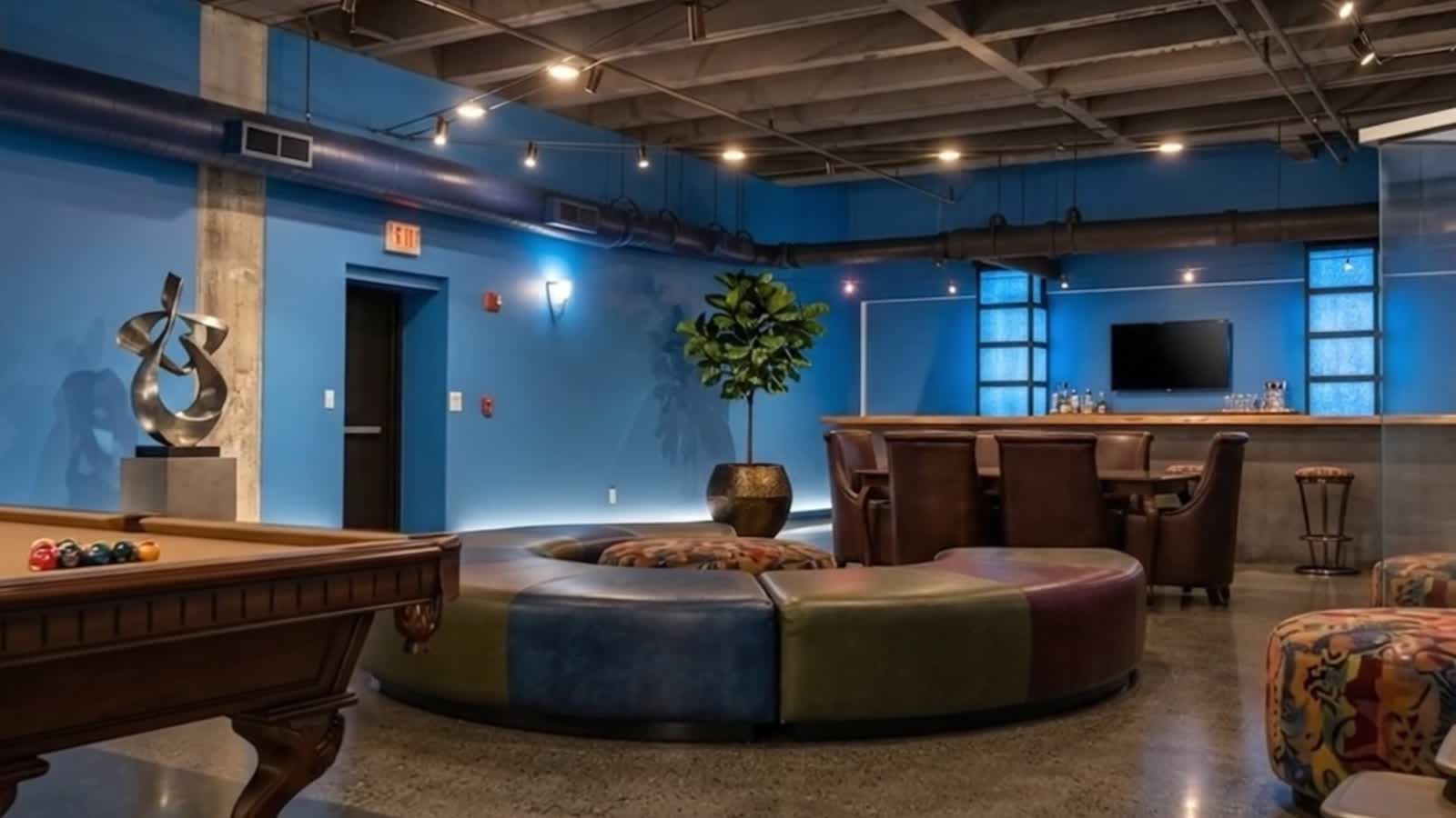 Resident lounge with billiards table and bar seating
